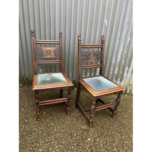 271 - A pair of carved oak chairs