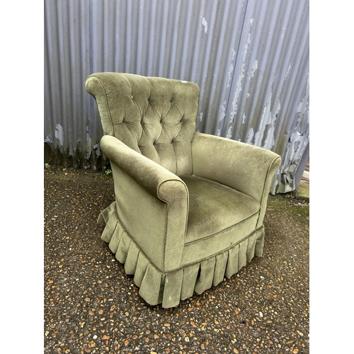 272 - A green upholstered button back chair