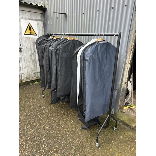 276 - 19 gents suits including several BOSS.
not including Rail!