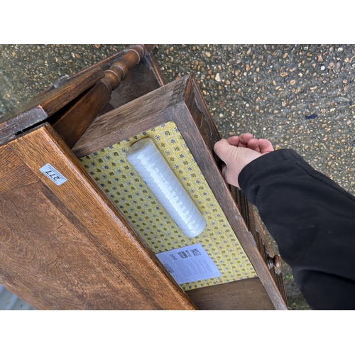 277 - An oak single drawer side table with drop leaf