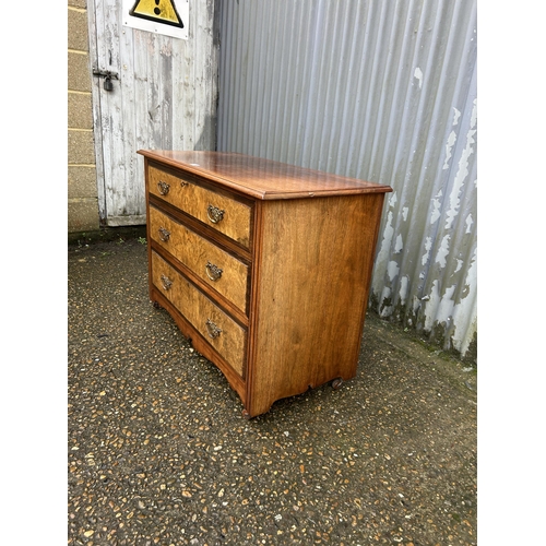 285 - An Edwardian mahogany and walnut chest of three drawers 105x50x77