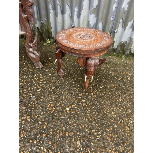 287 - A carved table and carved elephant table