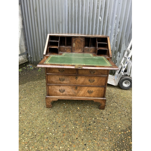 30 - A Georgian walnut bureau with fitted interior 77cm wide