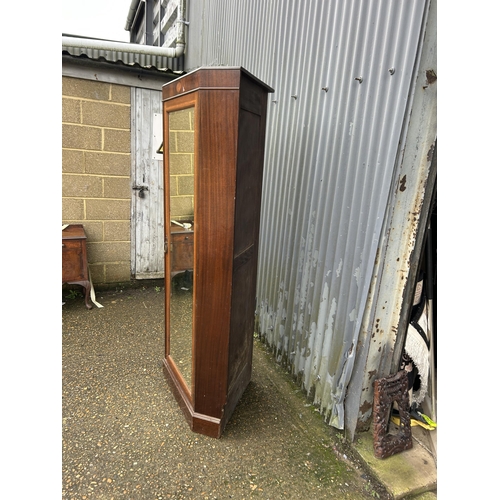 308 - An Edwardian mahogany inlaid single door corner wardrobe