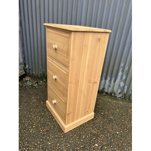 310 - A good quality solid pine three drawer filing cabinet