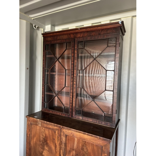 312 - A Victorian mahogany bookcase cupboard 104x55x220