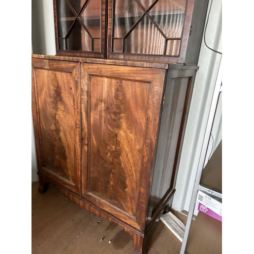 312 - A Victorian mahogany bookcase cupboard 104x55x220