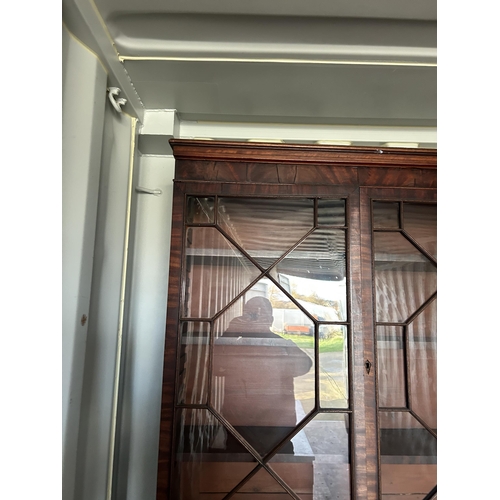 312 - A Victorian mahogany bookcase cupboard 104x55x220