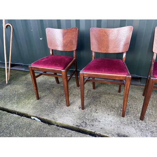 324 - A set of four 1920's oak dining chairs