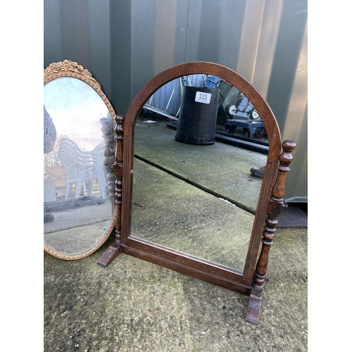 333 - An oak swing mirror and a gold gilt wall mirror