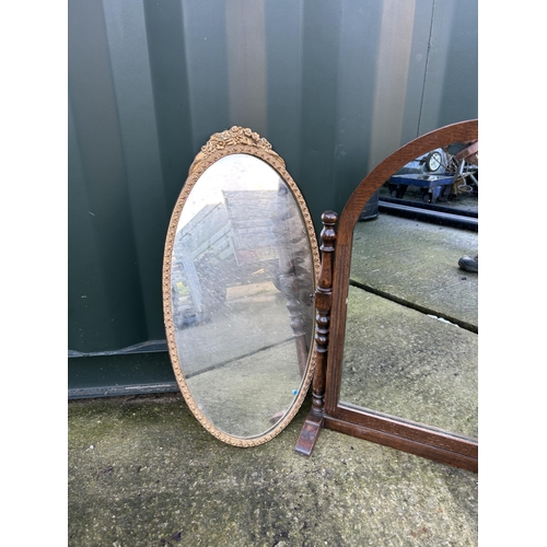 333 - An oak swing mirror and a gold gilt wall mirror