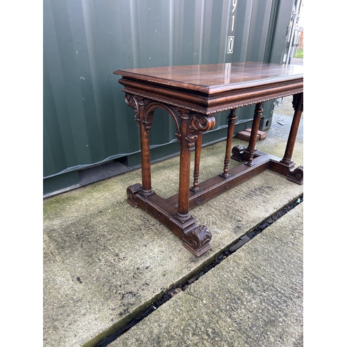 335 - A carved oak centre table 112x60x75