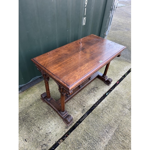 335 - A carved oak centre table 112x60x75