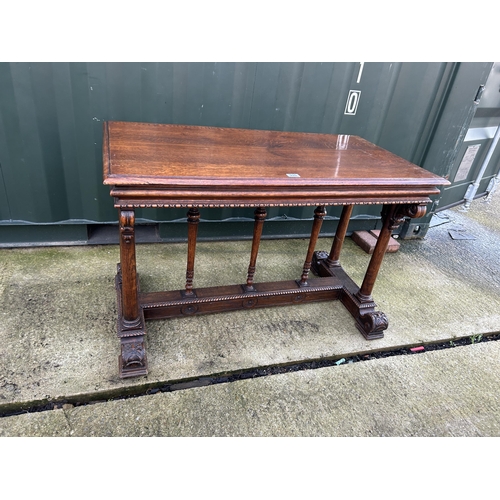 335 - A carved oak centre table 112x60x75