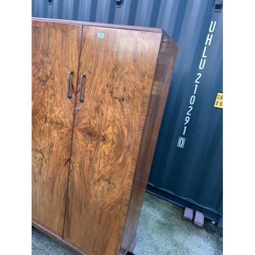 343 - A deco style walnut two door wardrobe part fitted to interior 101x44x180