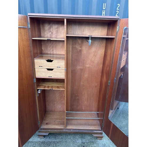 343 - A deco style walnut two door wardrobe part fitted to interior 101x44x180