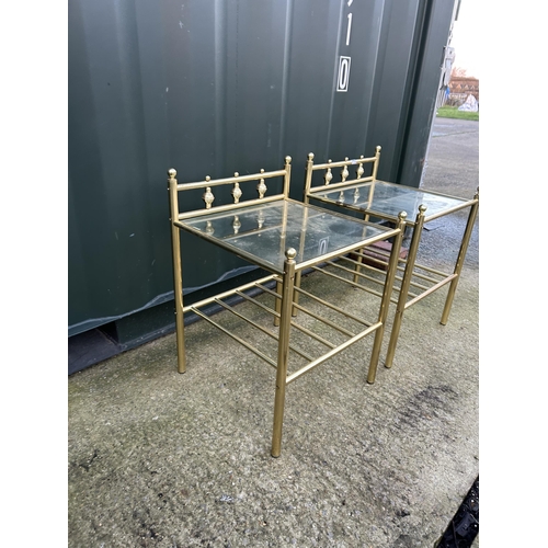 344 - A pair of brass bedside tables with drop in glass tops