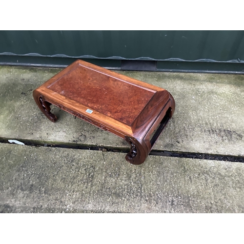 358 - An oriental hardwood coffee table