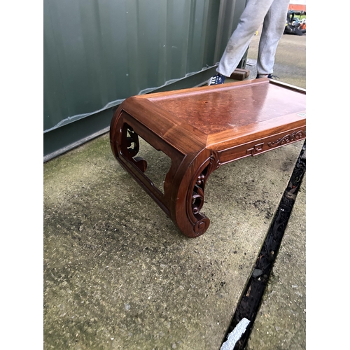 358 - An oriental hardwood coffee table