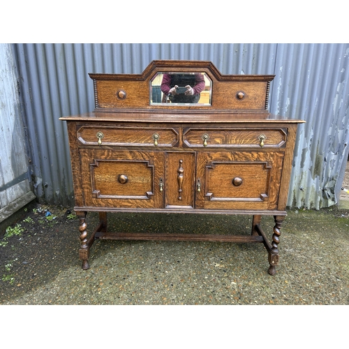 36 - A oak barley twist sideboard with mirror back 122x48x90