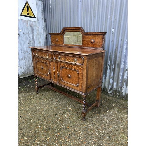 36 - A oak barley twist sideboard with mirror back 122x48x90