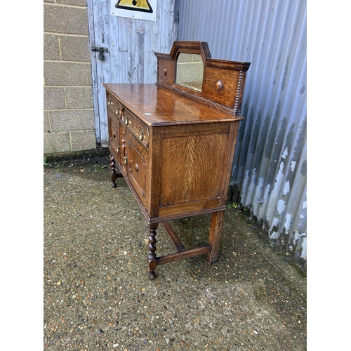 36 - A oak barley twist sideboard with mirror back 122x48x90