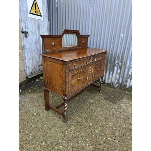 36 - A oak barley twist sideboard with mirror back 122x48x90