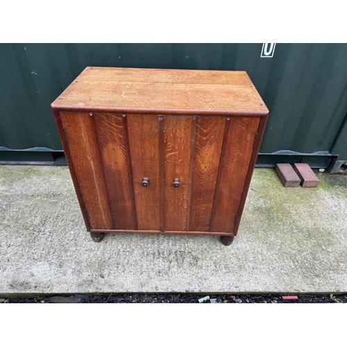 363 - A hand made oak two door cupboard 77x46x77