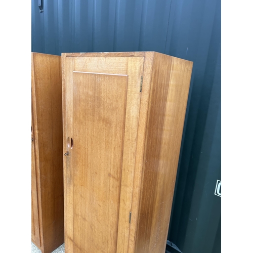 370 - A pair of early 20th century oak single wardrobes 62x45x155