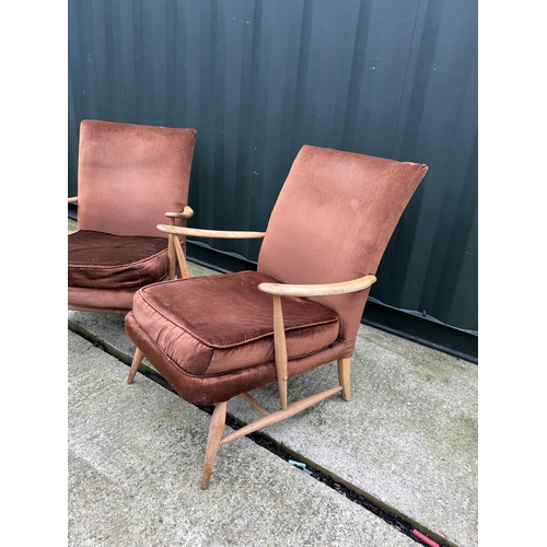 374 - A pair of ercol armchairs