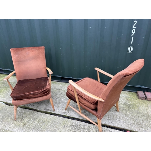 374 - A pair of ercol armchairs