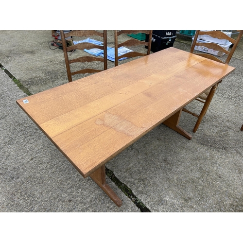 383 - An arts and crafts style oak refectory dining table together with five ladder back chairs  177x80x77