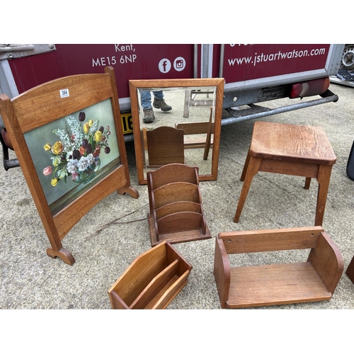 384 - Oak fire screen, oak mirror, three racks and a stool