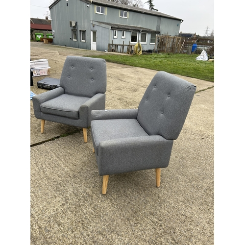 390 - A pair of modern grey upholstered armchairs