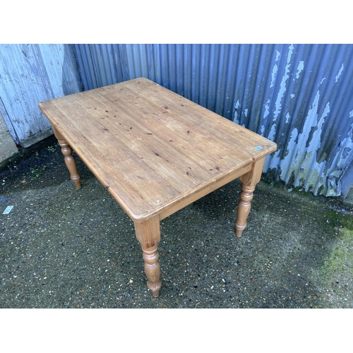 4 - A farmhouse pine kitchen table 87x137x75