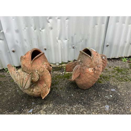 412 - A pair of terracotta fish planters