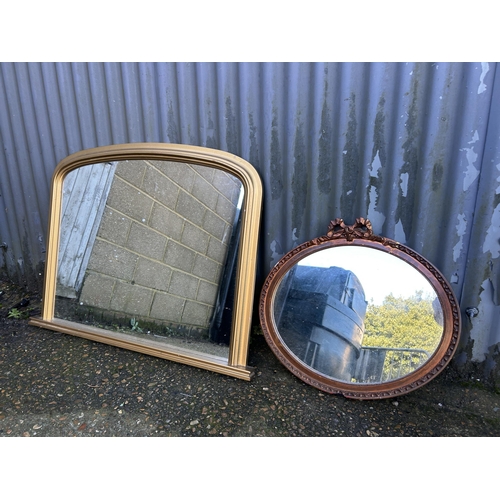 42 - A large gold over-mantle mirror together with an ornate circular mirror