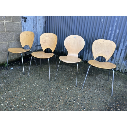 43 - Four bent ply and chrome chairs