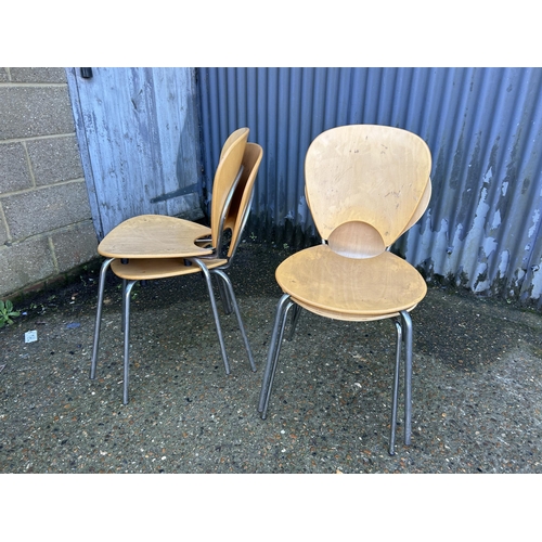 43 - Four bent ply and chrome chairs