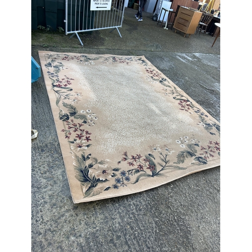 46 - A very large gold pattern carpet 240x330