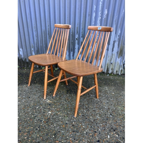 53 - Pair of stick back chairs