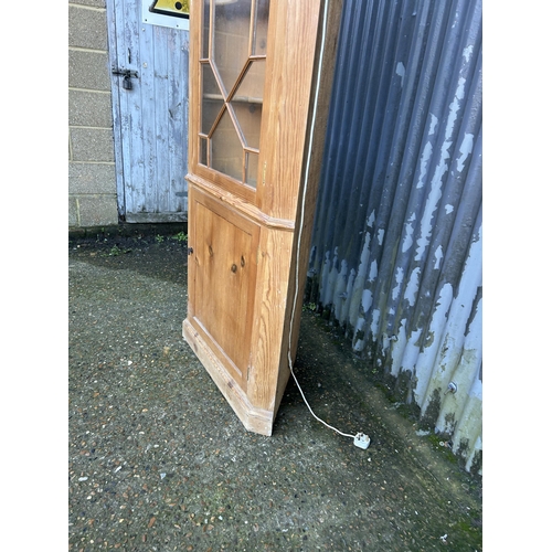 6 - A country pine corner cabinet