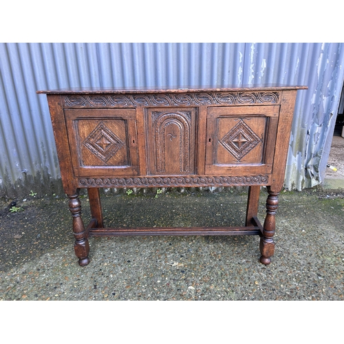 60 - A carved oak sideboard 106x36x80