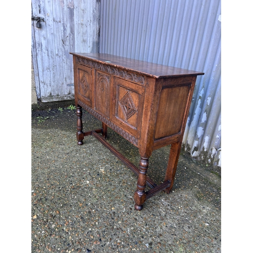 60 - A carved oak sideboard 106x36x80