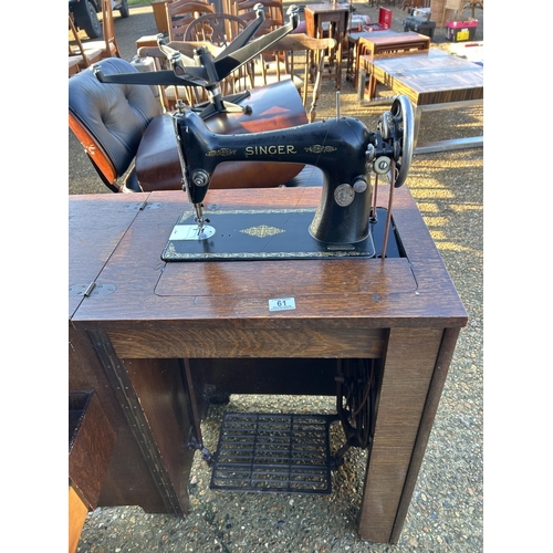 61 - A singer cabinet sewing machine