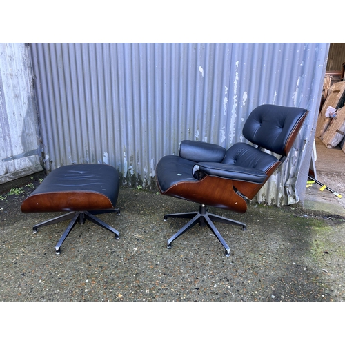 62 - A reproduction EAMES swivel chair and Ottoman footstool