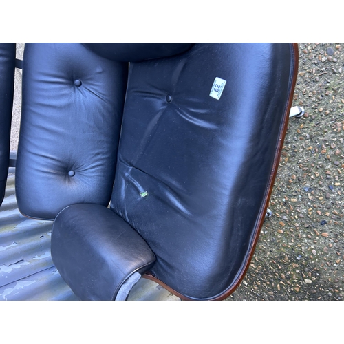 62 - A reproduction EAMES swivel chair and Ottoman footstool