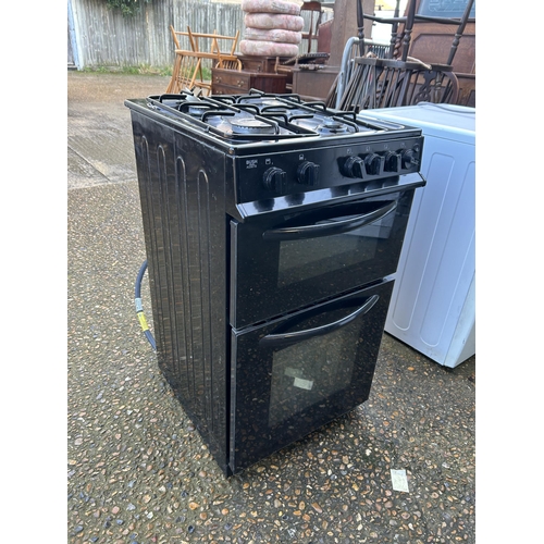 77 - A black gas cooker