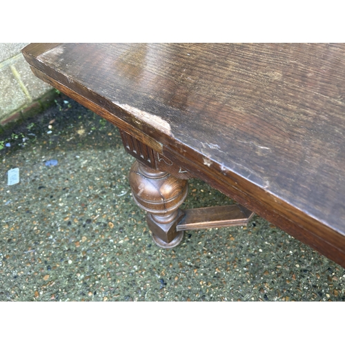 87 - A large oak drawer leaf table 137x84x74