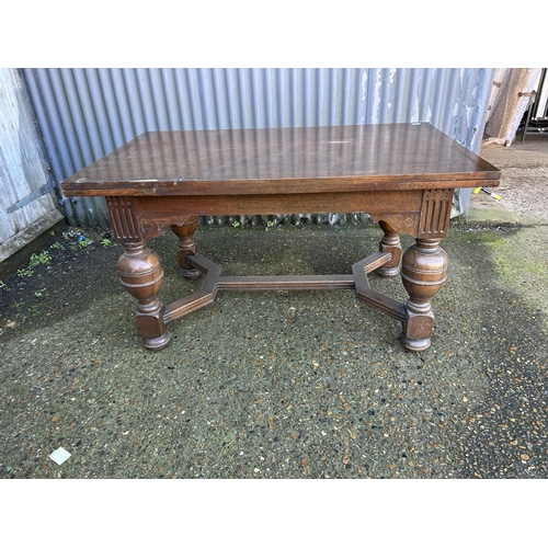 87 - A large oak drawer leaf table 137x84x74